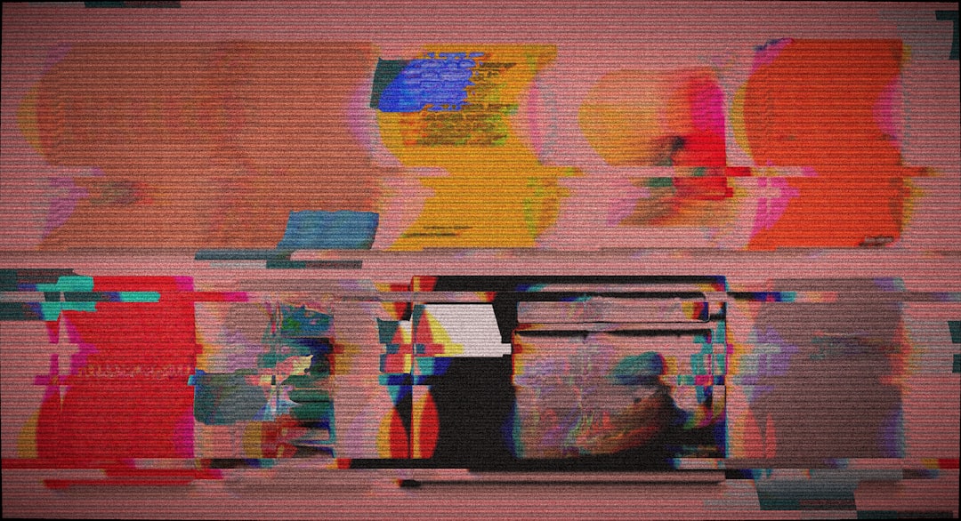 Glitchy abstract background with colorful panels and text. — Photo by Egor Komarov on Unsplash