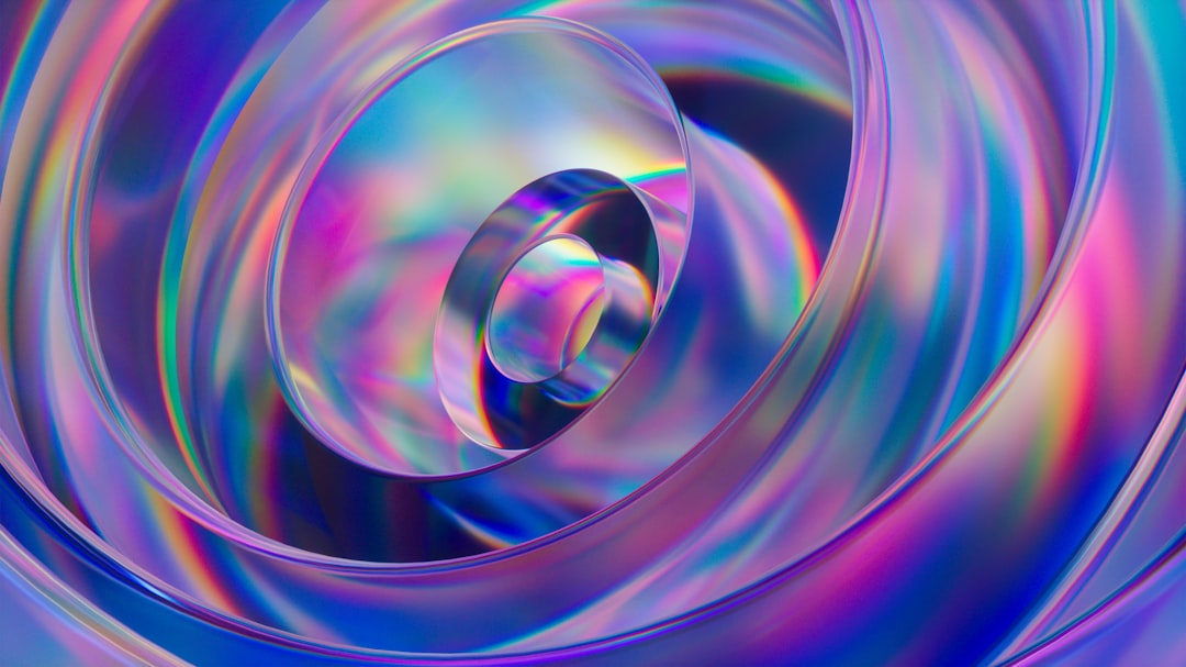 an abstract image of a circular object in blue and pink — Photo by Rohit Choudhari on Unsplash
