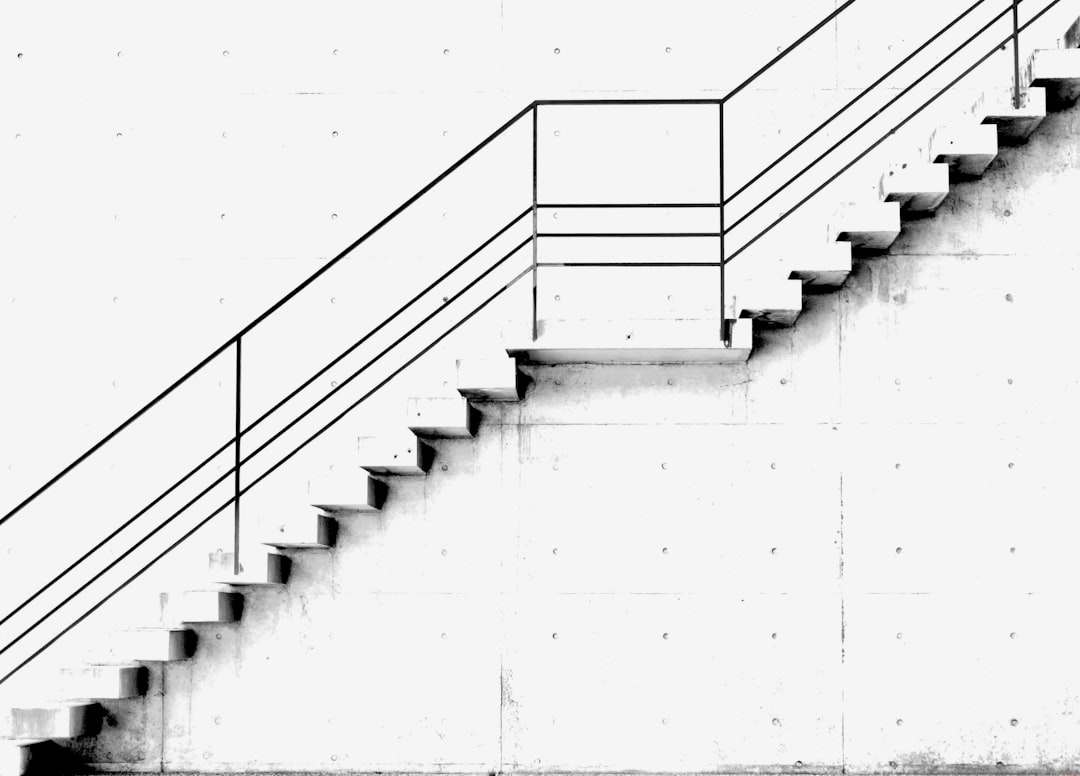 a set of stairs leading up to a building — Photo by Freysteinn G. Jonsson on Unsplash