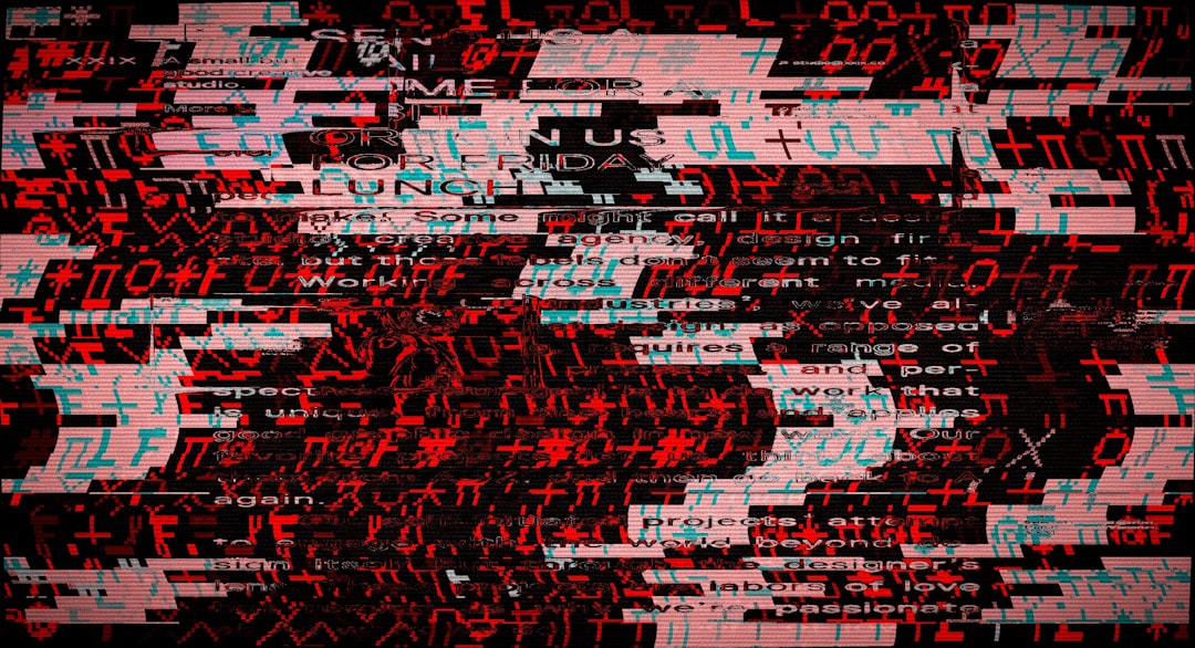 Abstract glitch art with red and white digital noise — Photo by Egor Komarov on Unsplash