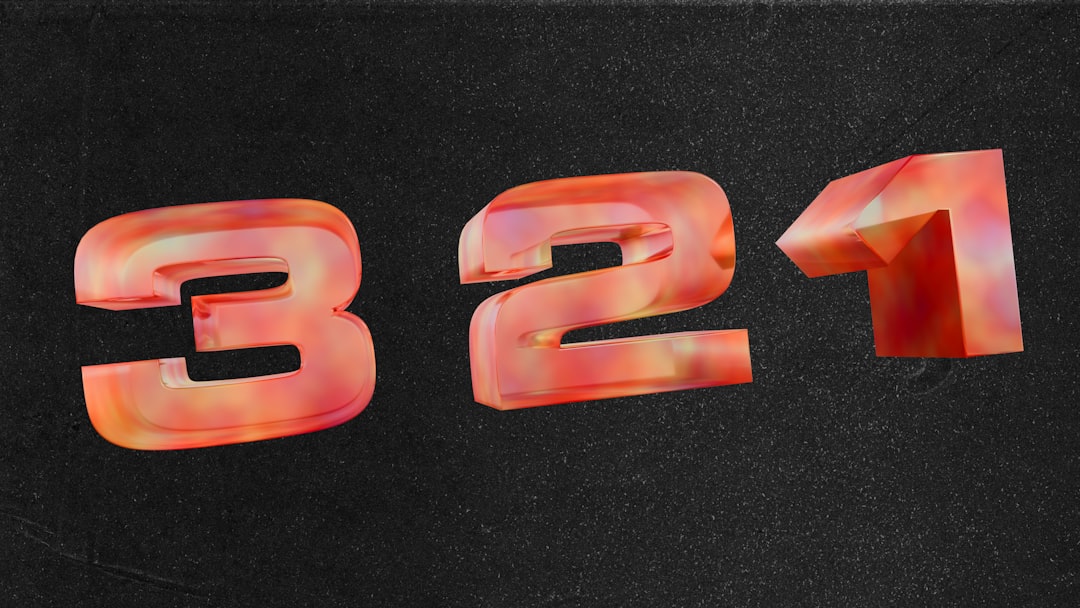 Three dimensional numbers 3 2 1 on dark background — Photo by Logan Voss on Unsplash