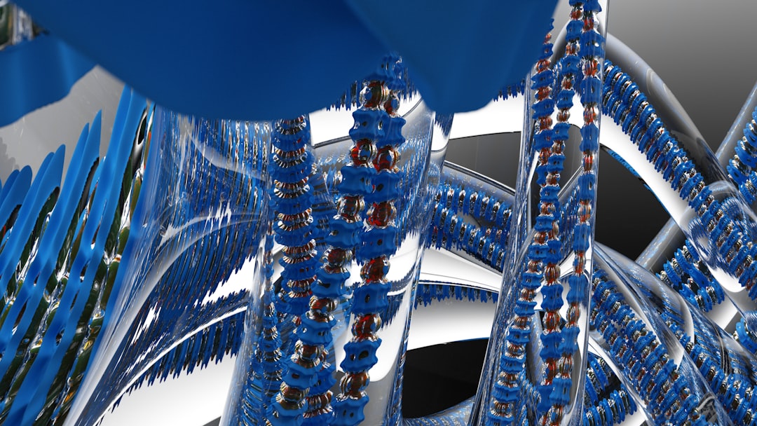 a computer generated image of blue and silver objects — Photo by Rick Rothenberg on Unsplash