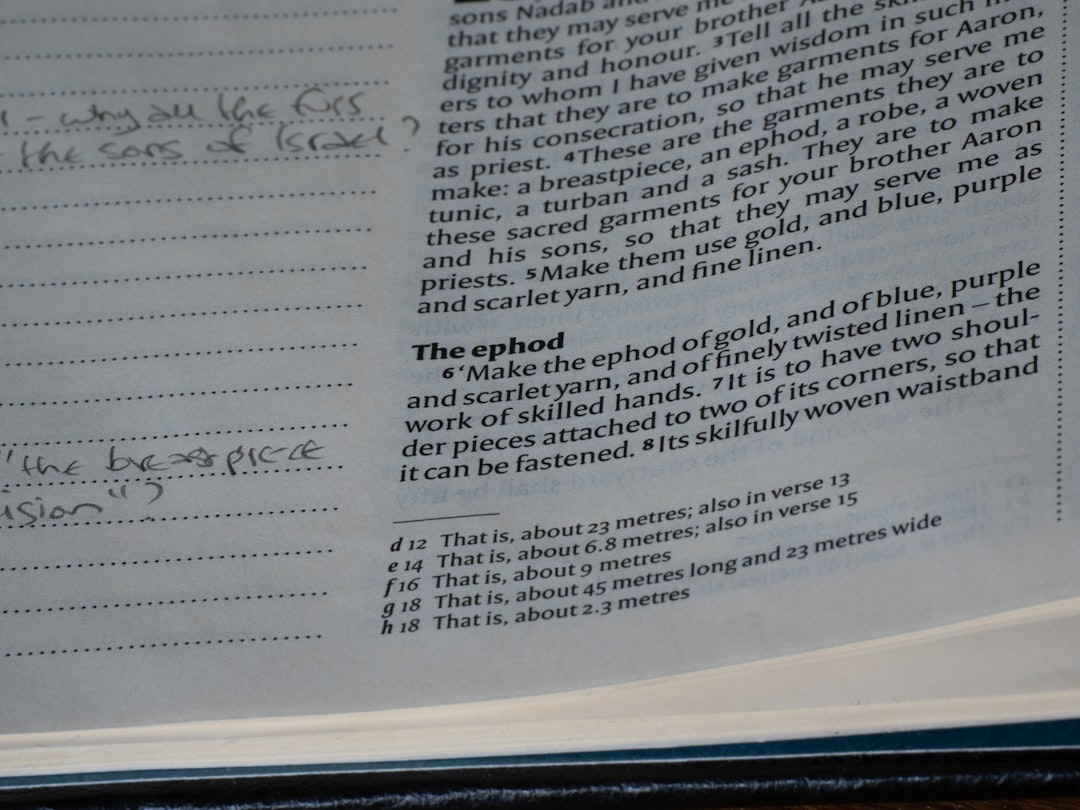 Close-up of handwritten notes beside printed text — Photo by Brett Jordan on Unsplash
