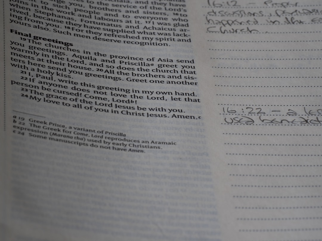 A close up of a book with writing on it — Photo by Brett Jordan on Unsplash