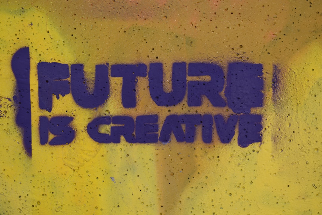 the words future is creative painted on a wall — Photo by Marija Zaric on Unsplash