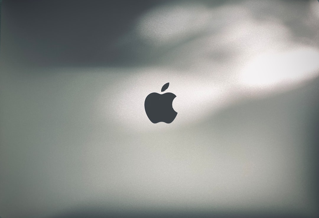 apple logo on white background — Photo by Austin Chen on Unsplash
