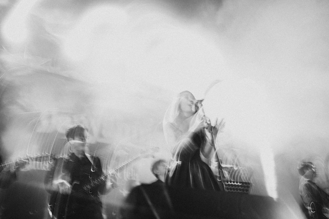 A group of people that are standing on a stage — Photo by Ivaldo Hadi on Unsplash