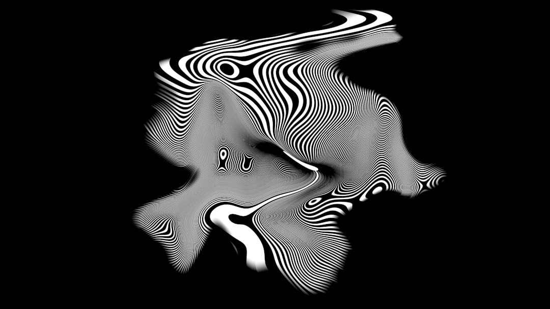 Abstract black and white wavy pattern on black background — Photo by Logan Voss on Unsplash