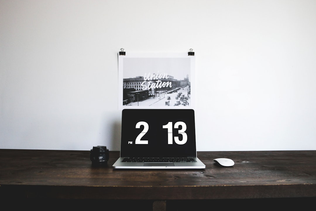 white and black analog clock at 2:13 — Photo by Alexis Presa on Unsplash