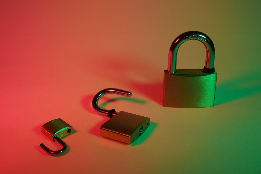 green and silver padlock on yellow surface — Photo by FlyD on Unsplash